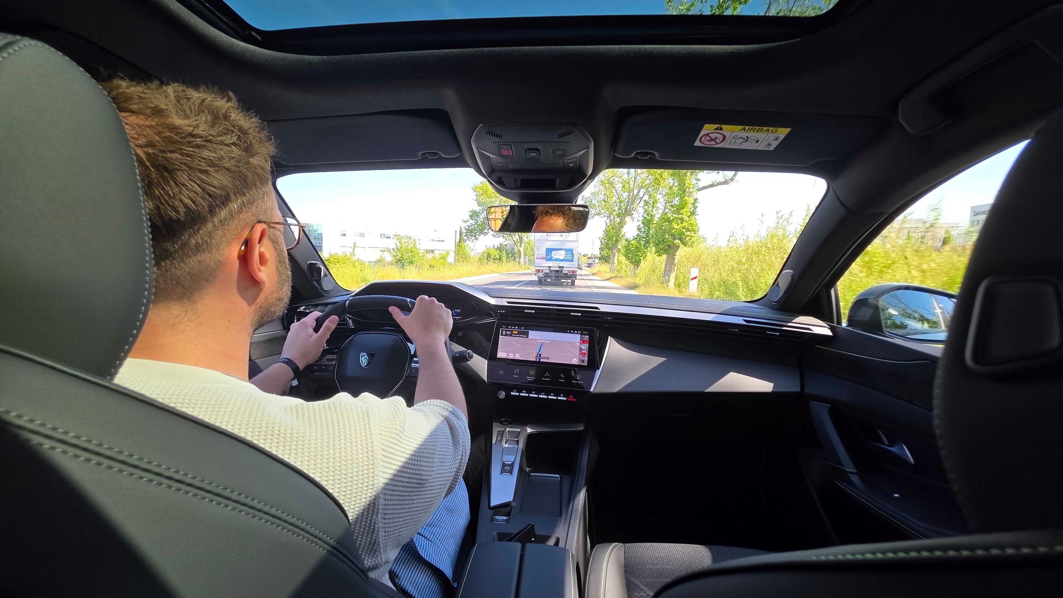 Charlie Harvey driving Peugeot 408 in Marseille
