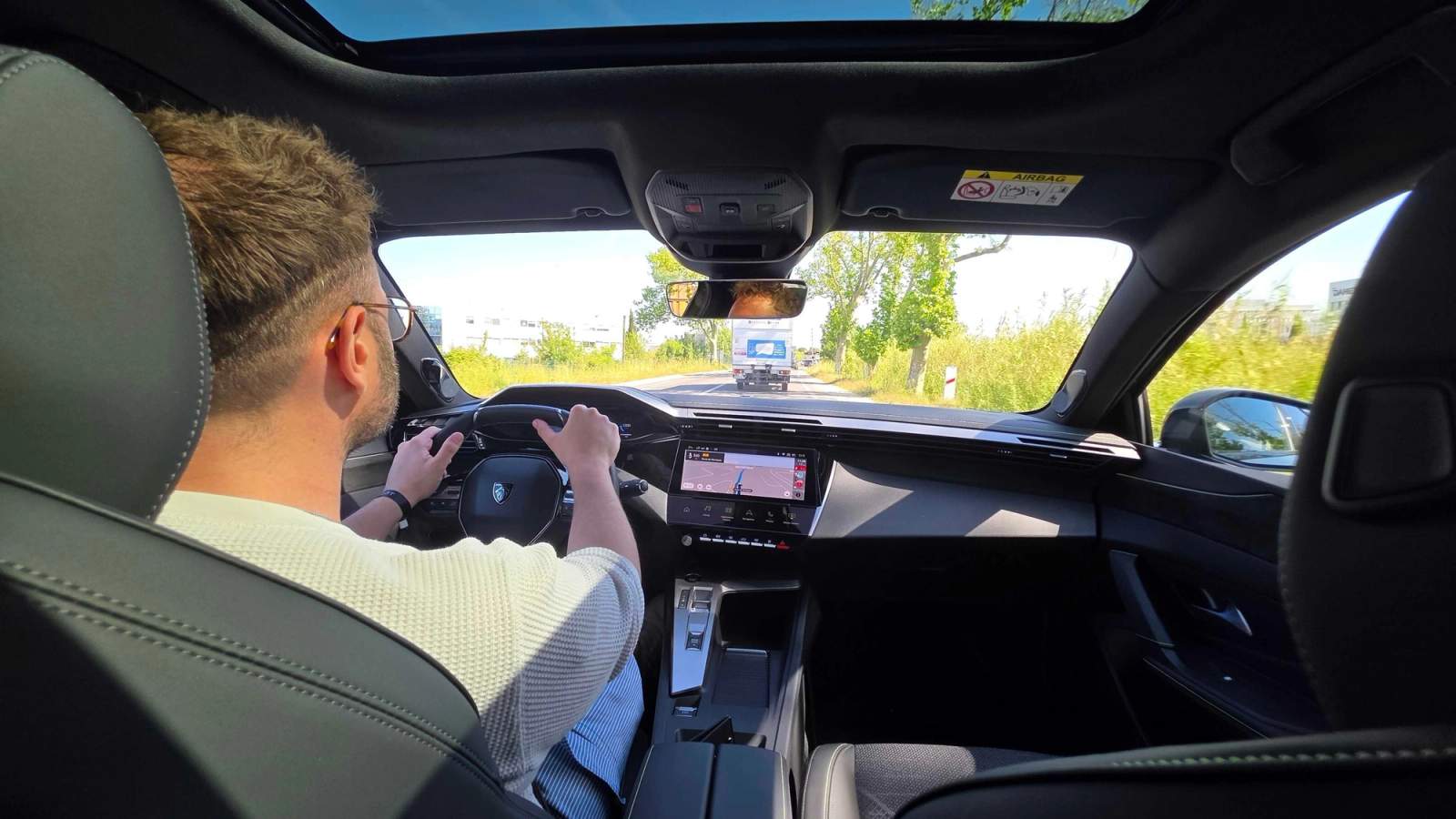 Charlie Harvey driving Peugeot 408 in Marseille