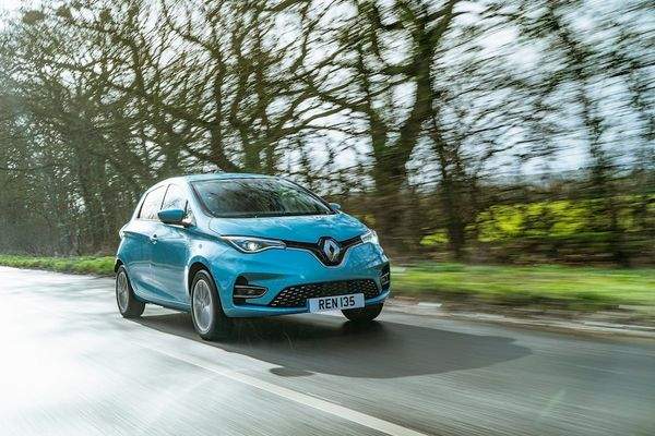 blue car on road