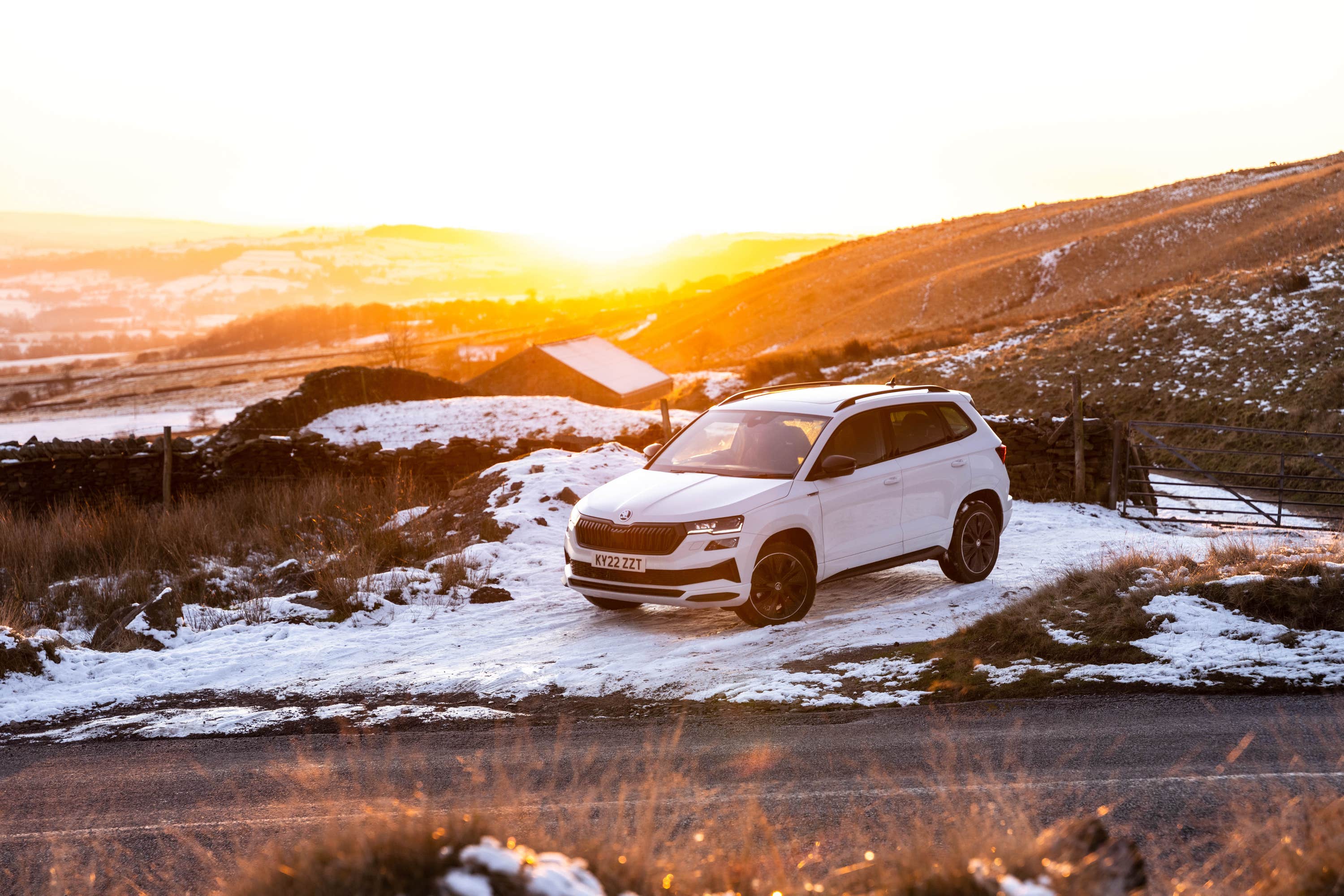 White Skoda Karoq on snow