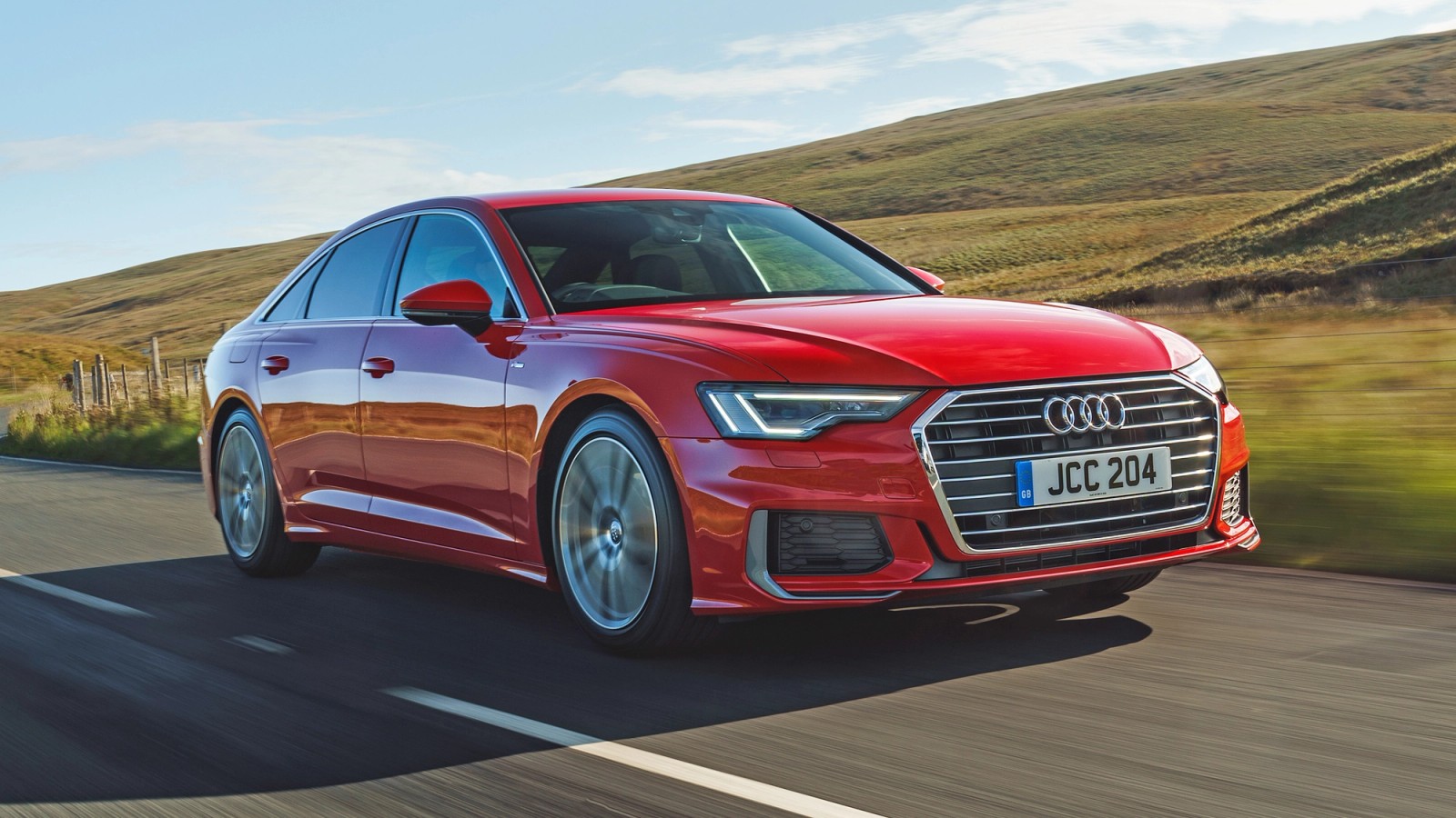Red Audi A6 front driving