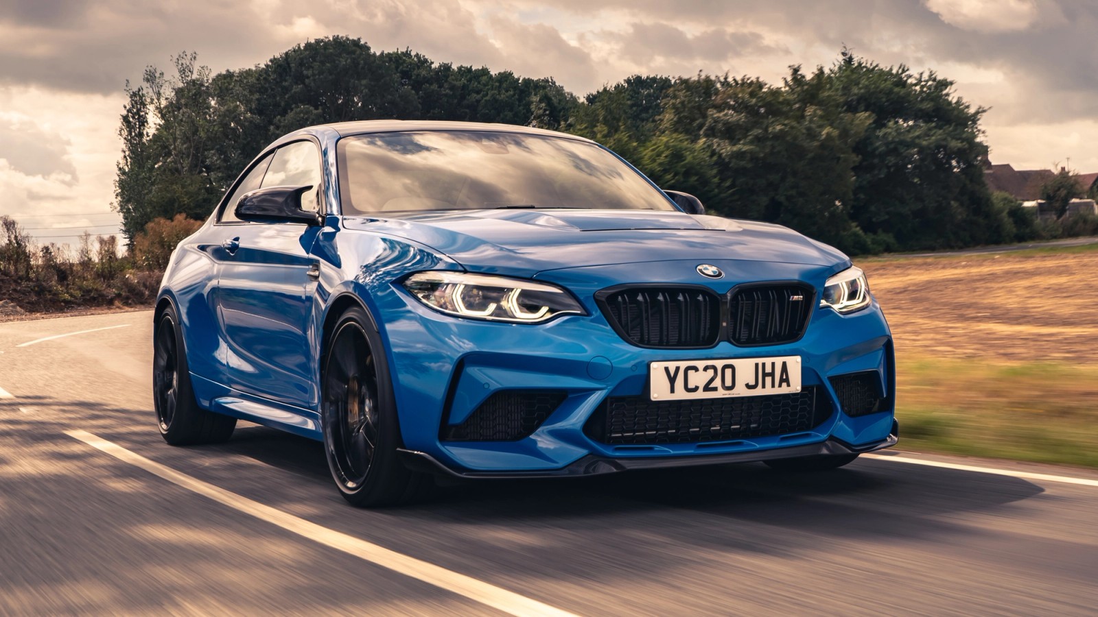 Blue BMW M2 CS front driving
