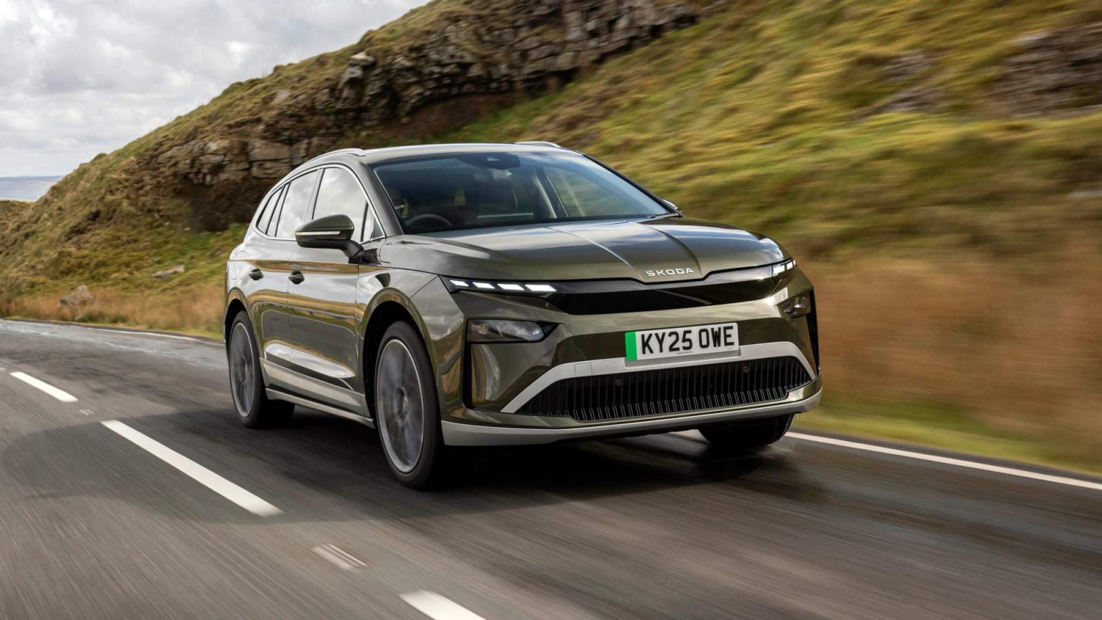 Green Skoda Enyaq driving
