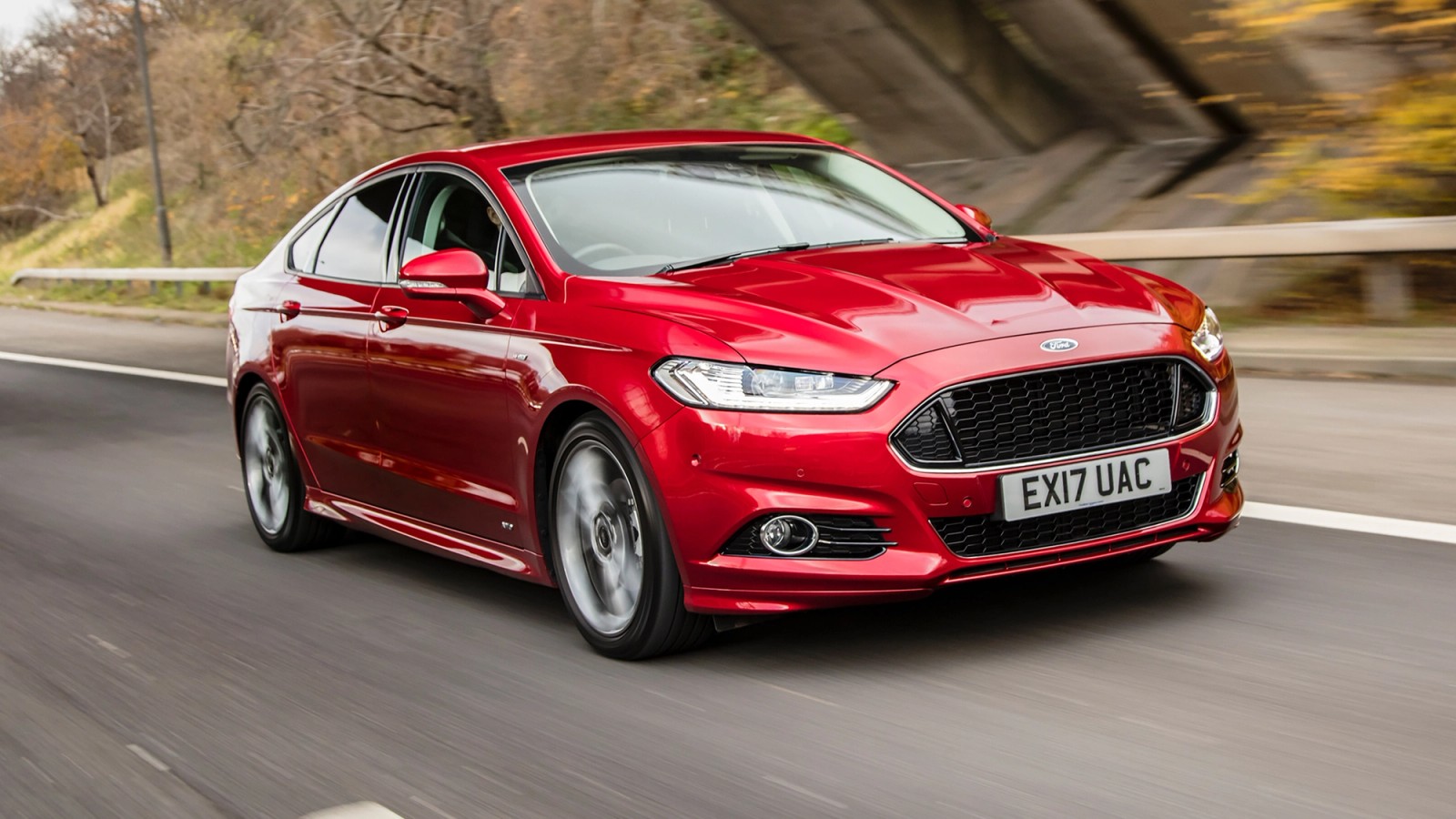 Red Ford Mondeo front driving
