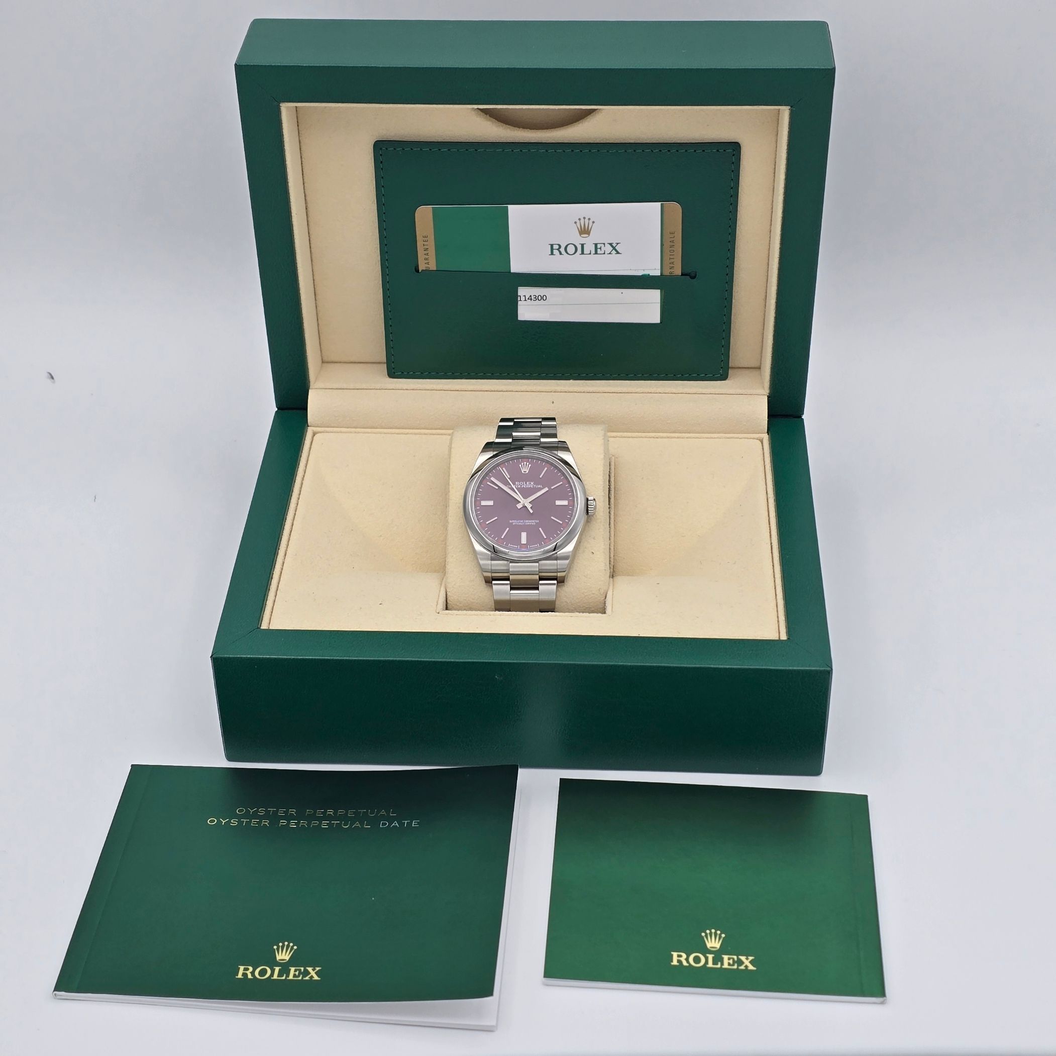 Rolex Oyster Perpetual Red Grape Ref. 114300 — alternate view — pre-owned luxury watch at Pertempus