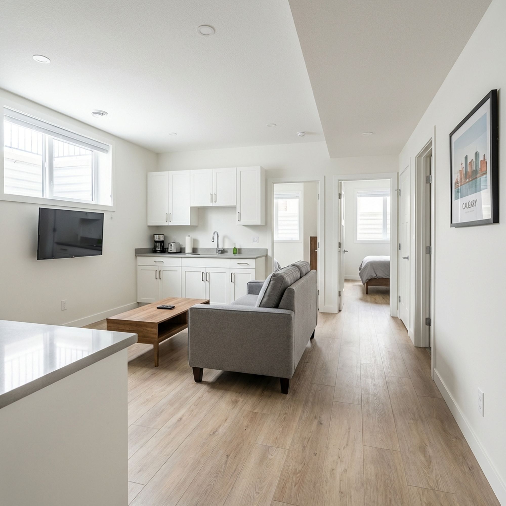 Bright and modern legal basement rental suite with LVP flooring