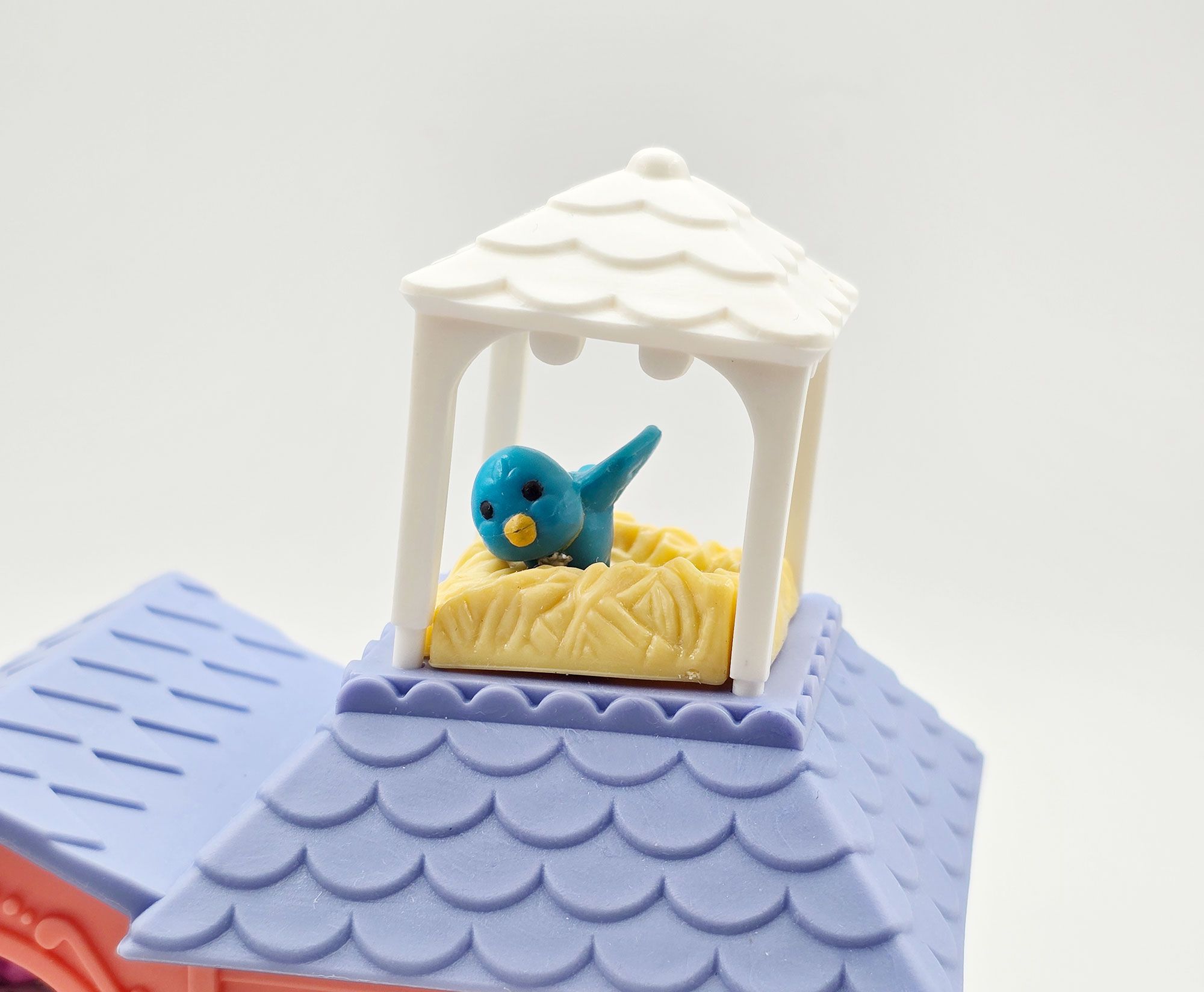 Detailed view of House with roof, birdhouse and grassy platform Garden Tag Friends