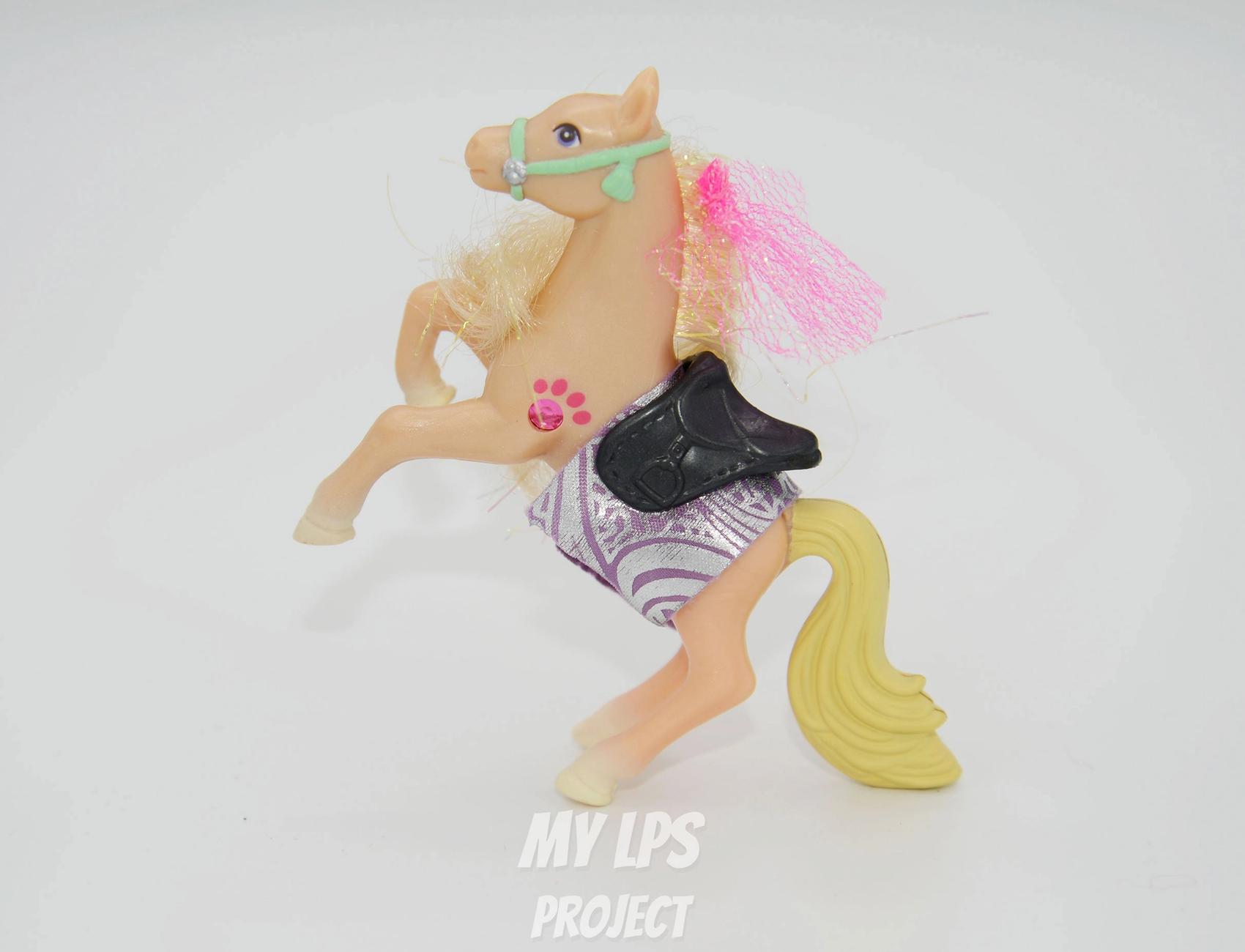 Tan Prancing Champion Pony