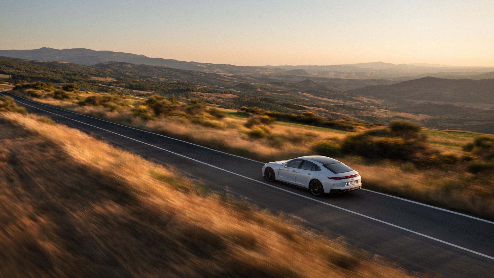 Val d’Orcia in Porsche Panamera 4: a dream weekend - Rolling through Tuscany’s most iconic landscapes between scenic roads, timeless villages and grand touring comfort