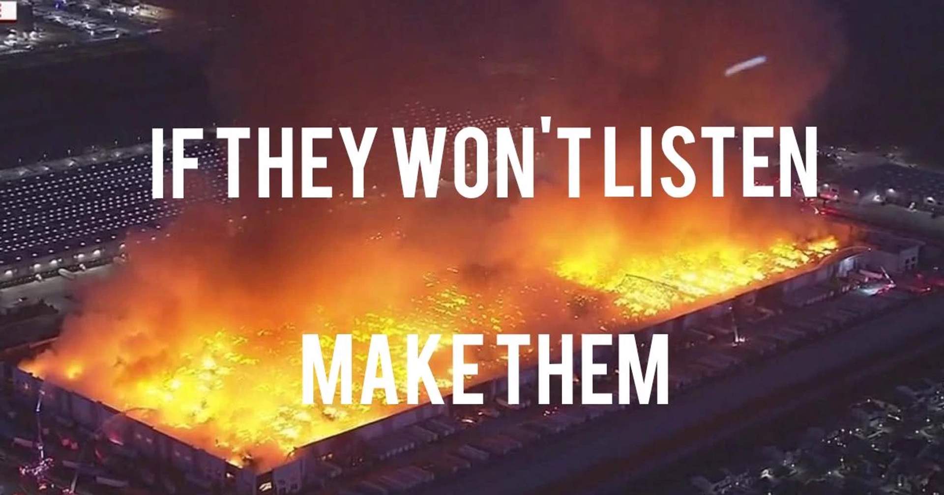 Aerial shot of entire Kimberly-Clark warehouse engulfed in flames. Text-overlay: If they won't listen, make them.