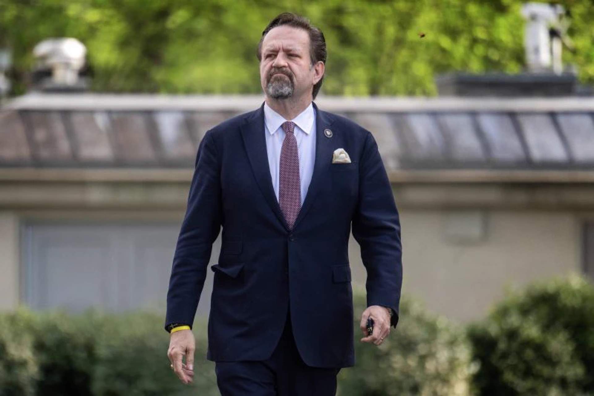 Sebastian Gorka walks outside the White House after unveiling new counterterrorism plan