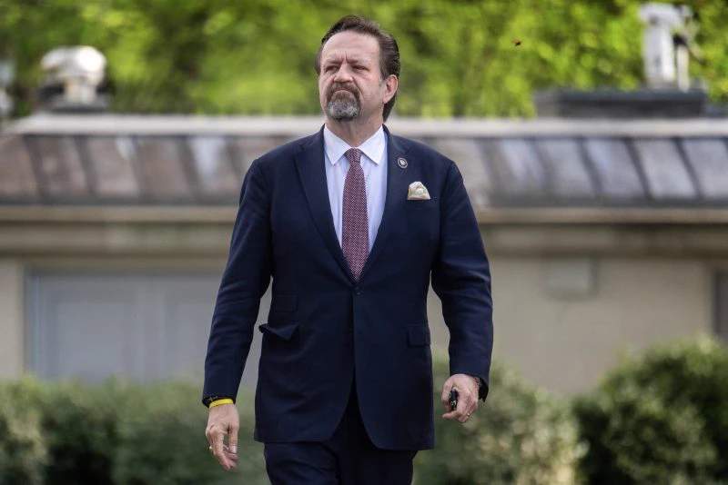 Sebastian Gorka walks outside the White House after unveiling new counterterrorism plan