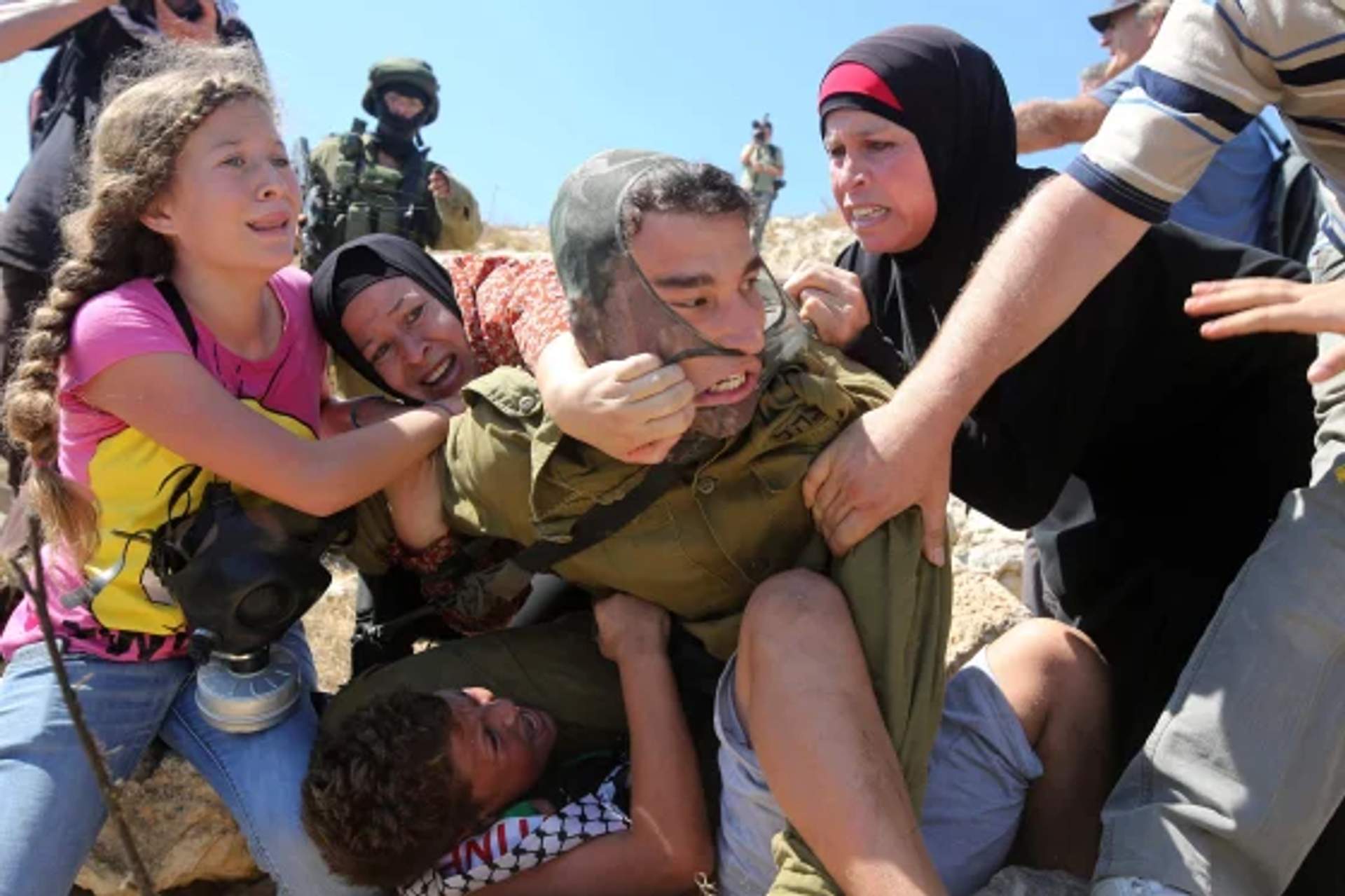 Palestinian Ahed Tamimi fighting to free a Palestinian boy held by an Israeli soldier  in the West Bank village of Nabi Saleh  Aug. 28, 2015