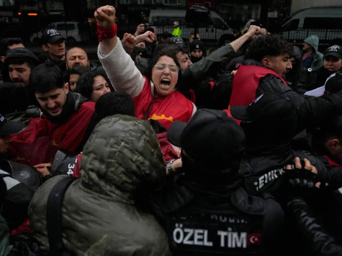 Union members scuffle with Turkish police officers as they try to march towards Taksim square in Istanbul, Turkey, Friday, May 1, 2026