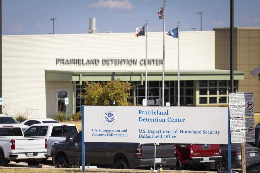 Aerial view of the Prairieland ICE Detention Center facility in Alvarado, Texas, showing multiple buildings surrounded by fencing and fields