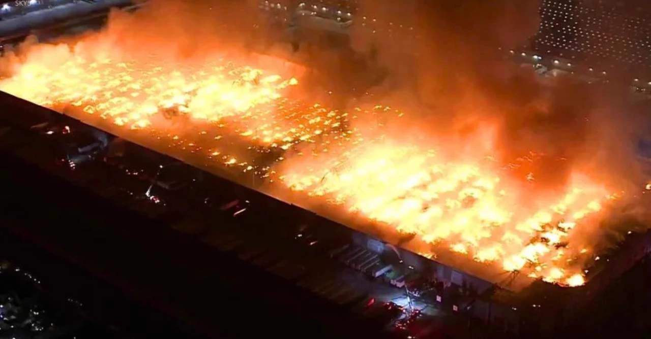 1.2 million sqft Kimberly-Clark warehouse engulfed in flames. (Aerial)