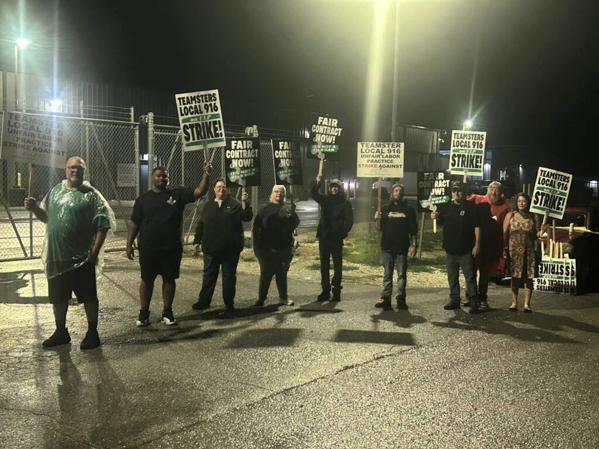 Teamsters Local 916 members maintain an early-morning picket line outside the Ascend Wellness cannabis grow house in Barry, Illinois