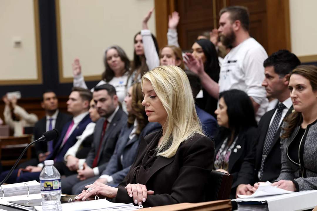 Pam Bondi averts her eyes in shame as Epstein survivors raise hands if she has not interviewed them in the case.