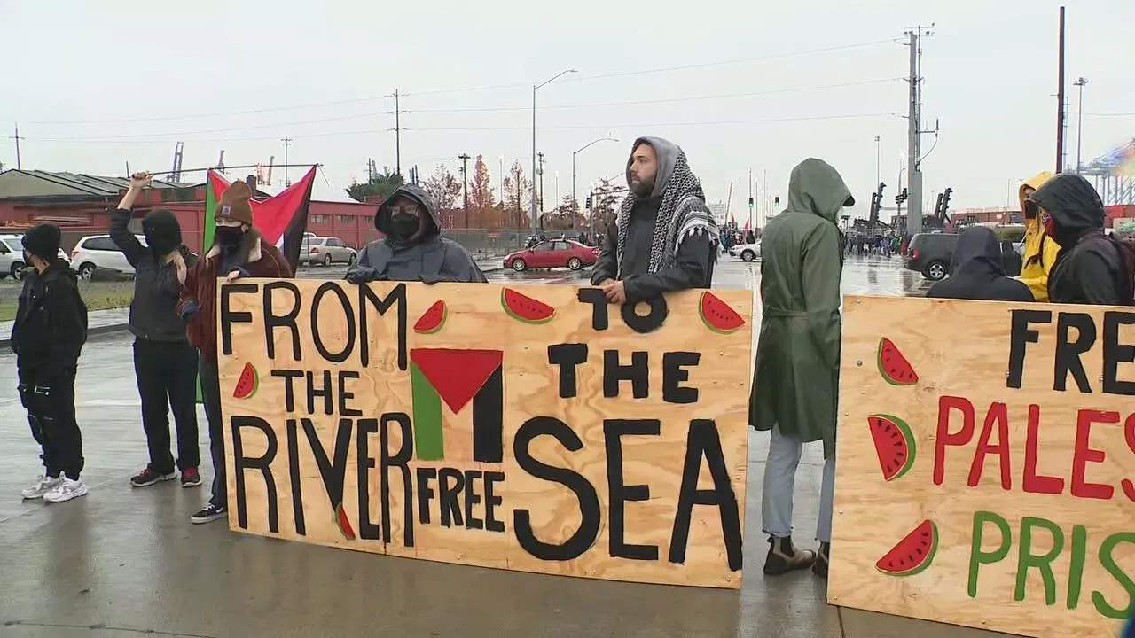 Pro-Palestinian demonstrators swarm the Port of Tacoma to protest a Middle East-bound ship full of what they believe to be military equipment and weapons. Nov. 6, 2023