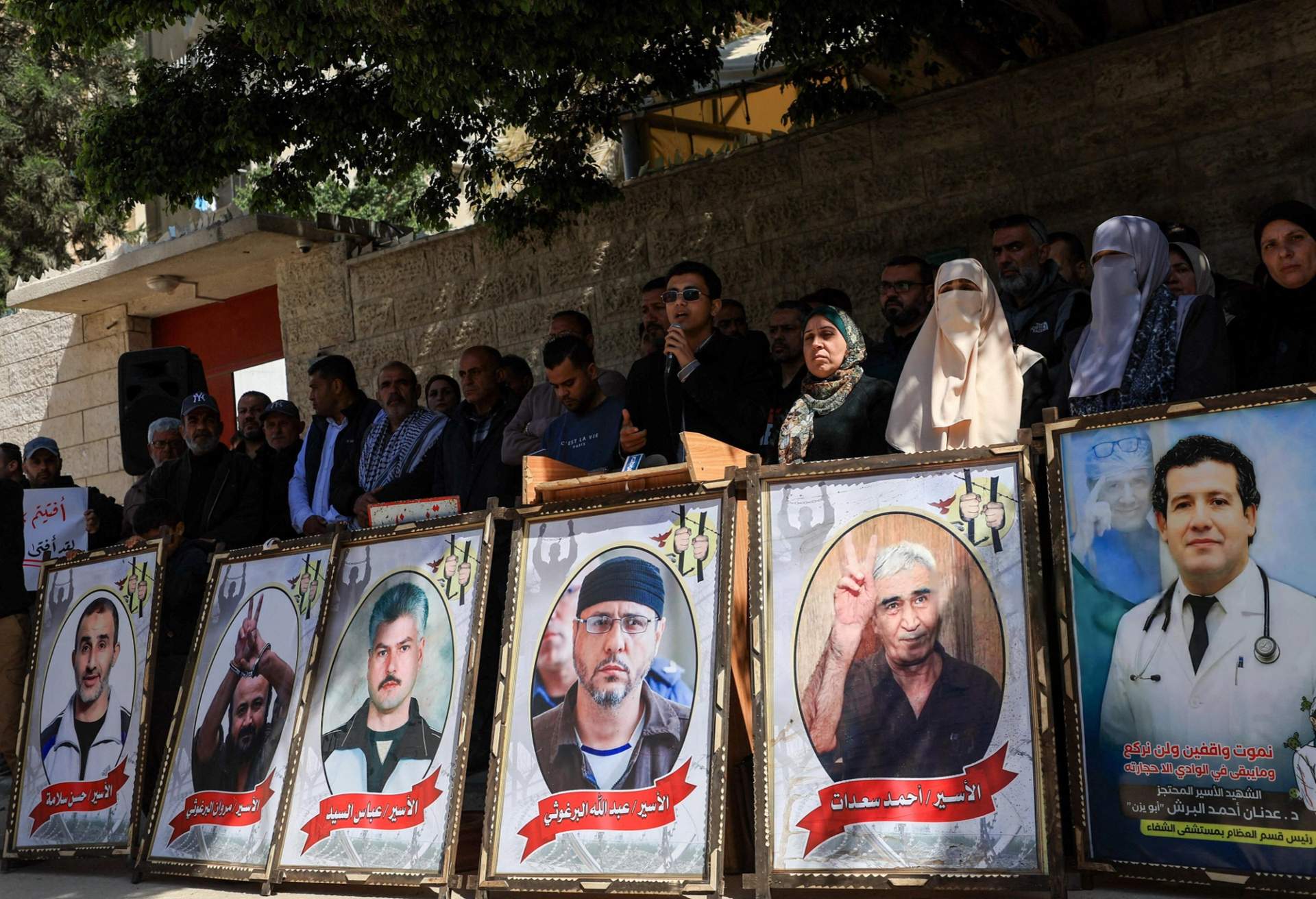 Palestinians protest at the Red Cross headquarters in Gaza City on March 31, 2026, against Israeli military court death penalty rulings.