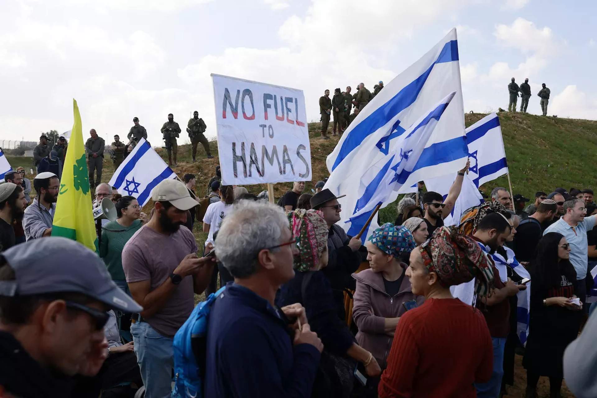 Israeli protesters block aid trucks at Kerem Shalom border crossing Gaza Strip January 29 2024 [Menahem Kahana  AFP]