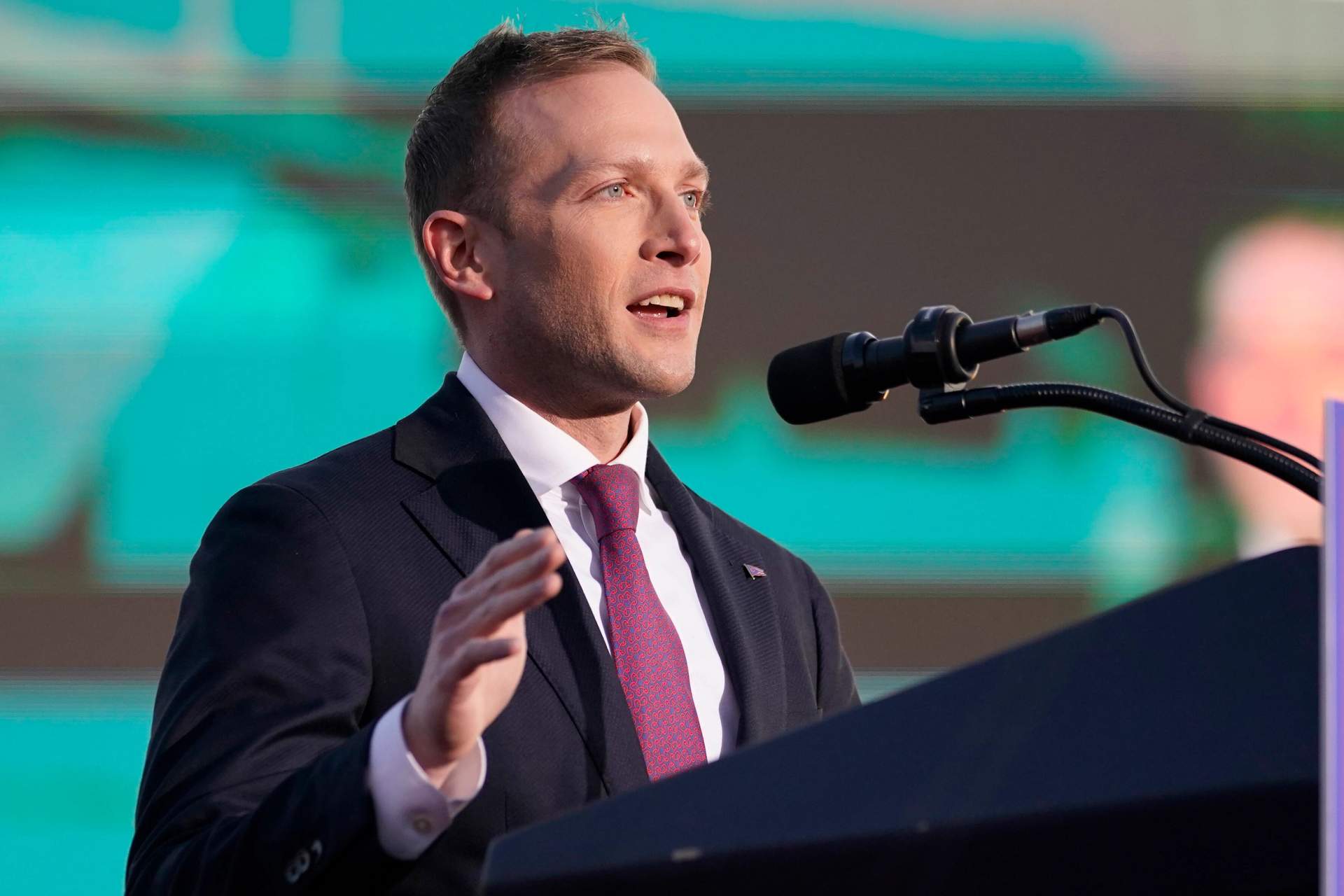 Republican Rep. Max Miller, who served as a White House aide to Trump before entering Congress, speaks at a 2022 campaign rally. Miller is one of Trump's most loyal followers and is being challenged by eight Democrats including union ironworker Brian Poindexter.