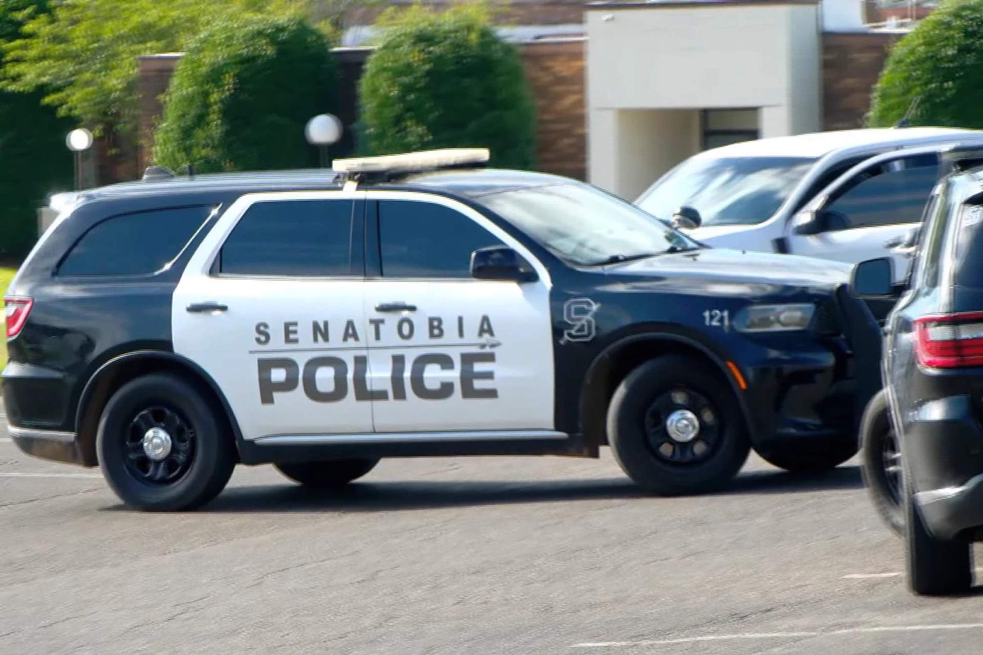 A Senatobia Police Department SUV parked on a street in a small Mississippi town during protests over the police killing of one-year-old Kohen Wiley