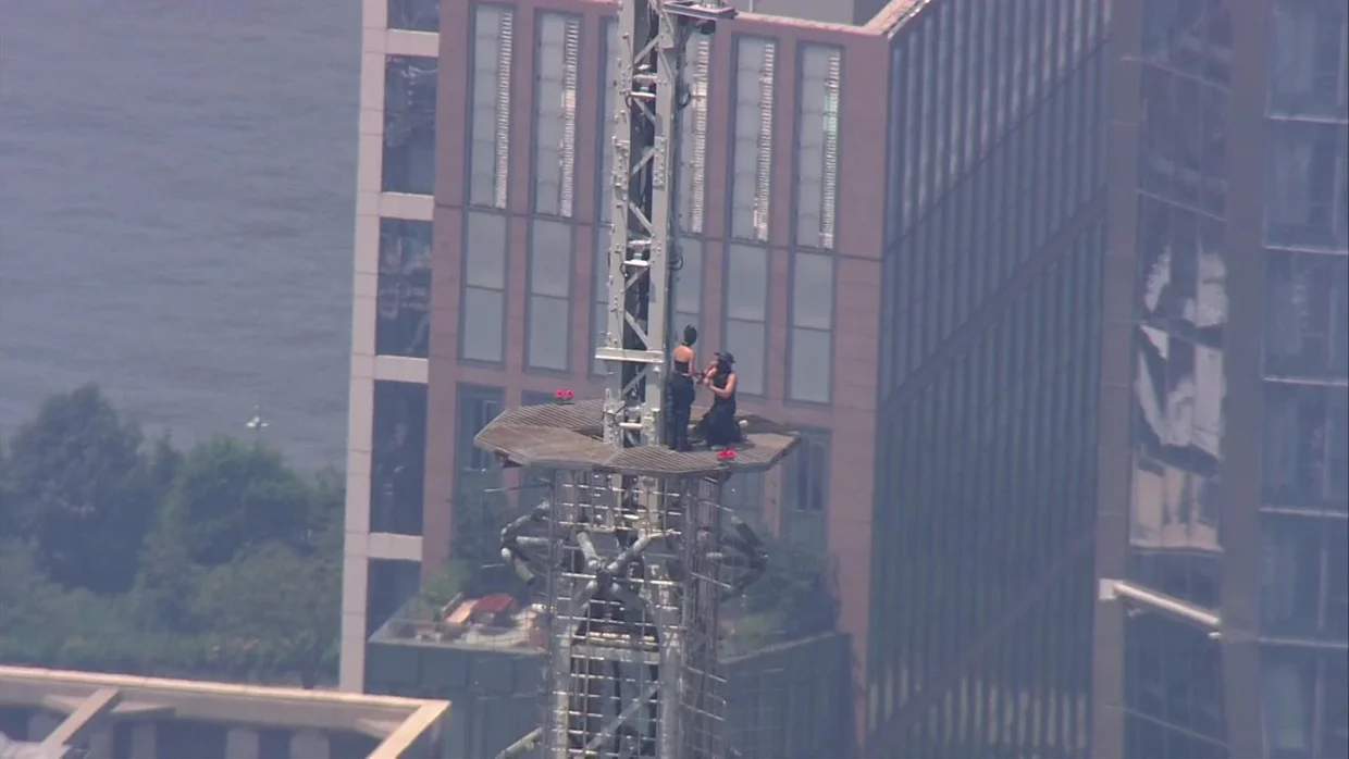 Ivan proposes to Angela on top of a platform midway up the radio antenna spire.