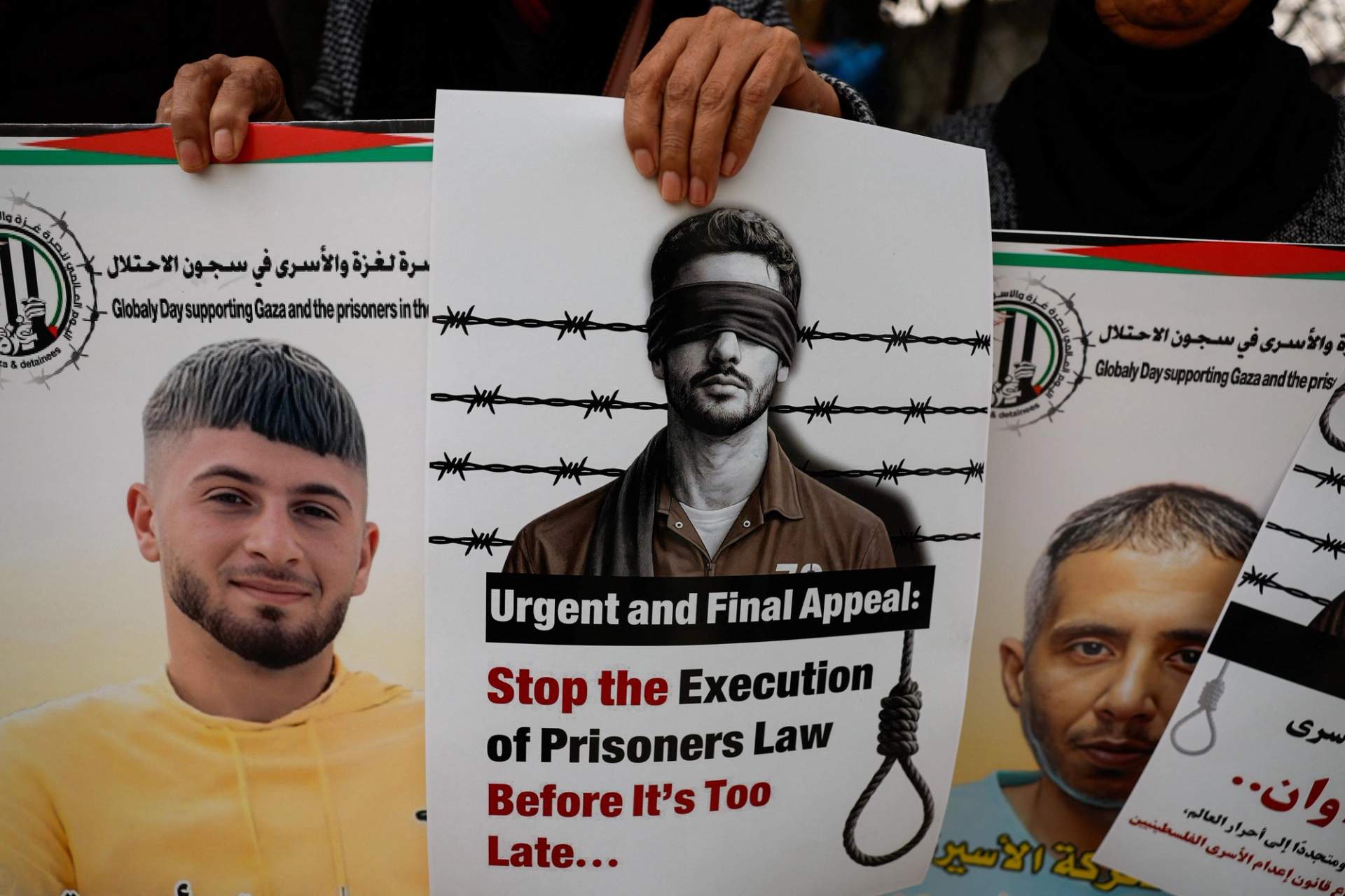 Palestinians protest at the Red Cross headquarters in Gaza City on March 31, 2026, against Israeli military court death penalty rulings.
