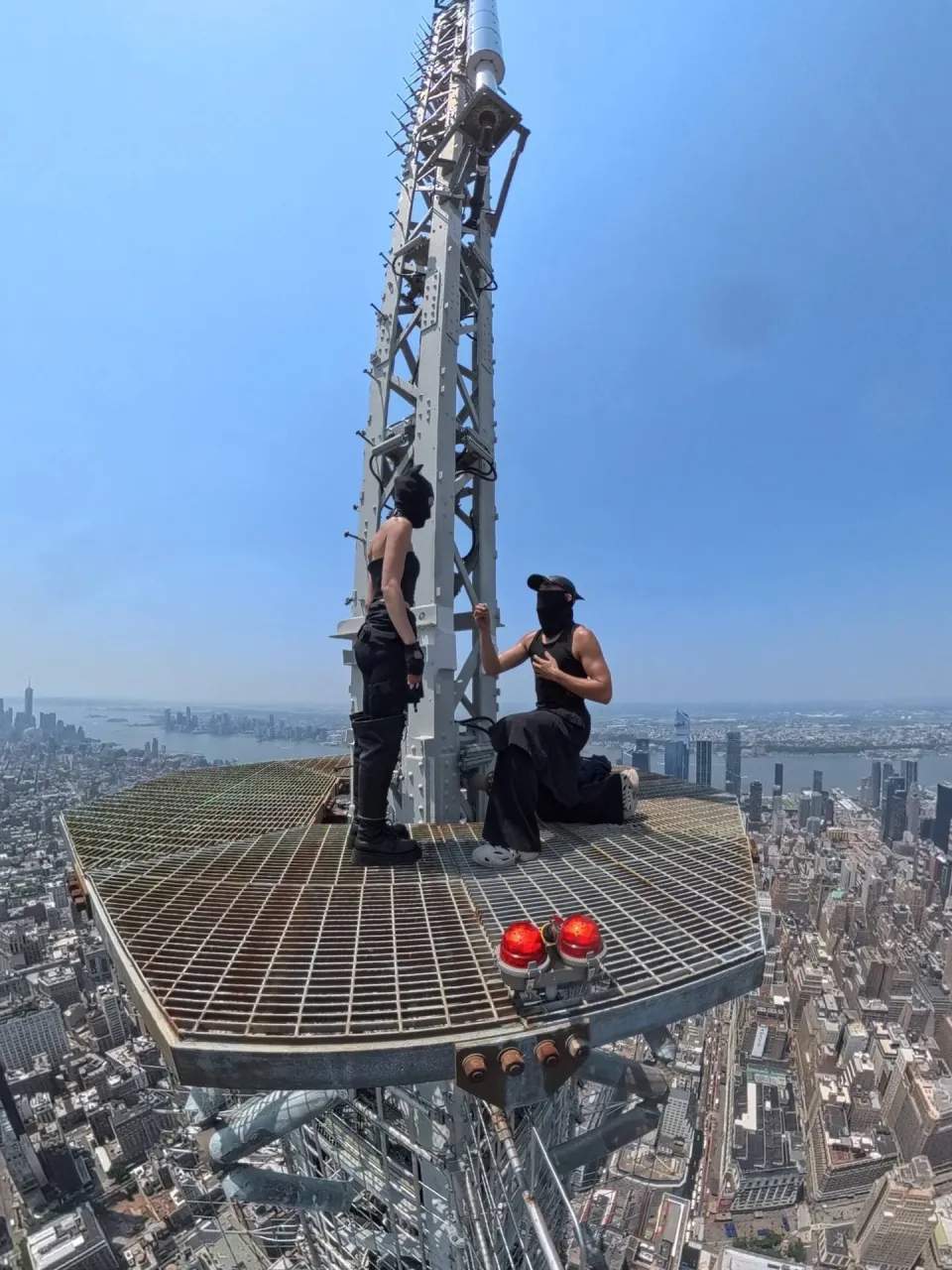 Ivan on 1 knee proposing to Angela 1500ft above Manhattan.