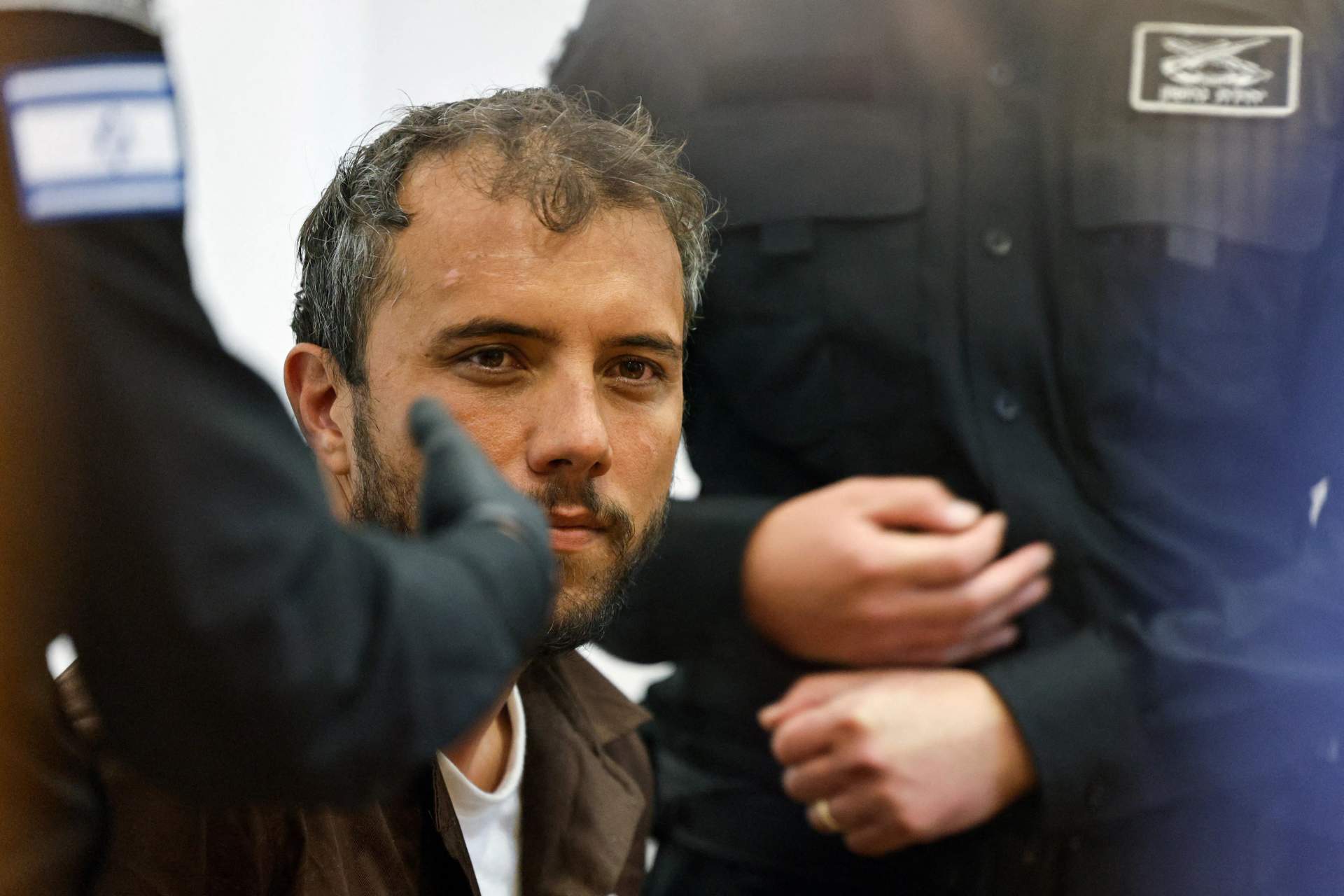 Saif Abu Keshek (left) and Thiago Ávila appear at a court in Beersheba, Israel, on May 5, 2026. Both were abducted by Israeli forces in international waters while on a humanitarian mission to deliver aid to Gaza.