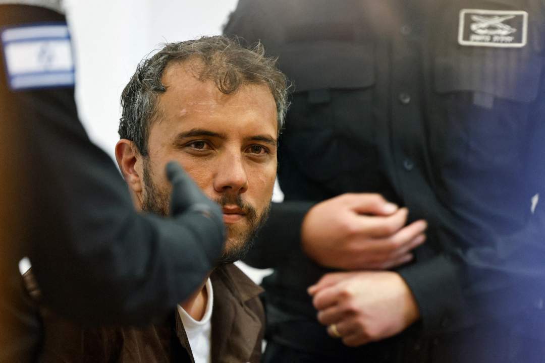 Saif Abu Keshek (left) and Thiago Ávila appear at a court in Beersheba, Israel, on May 5, 2026. Both were abducted by Israeli forces in international waters while on a humanitarian mission to deliver aid to Gaza.