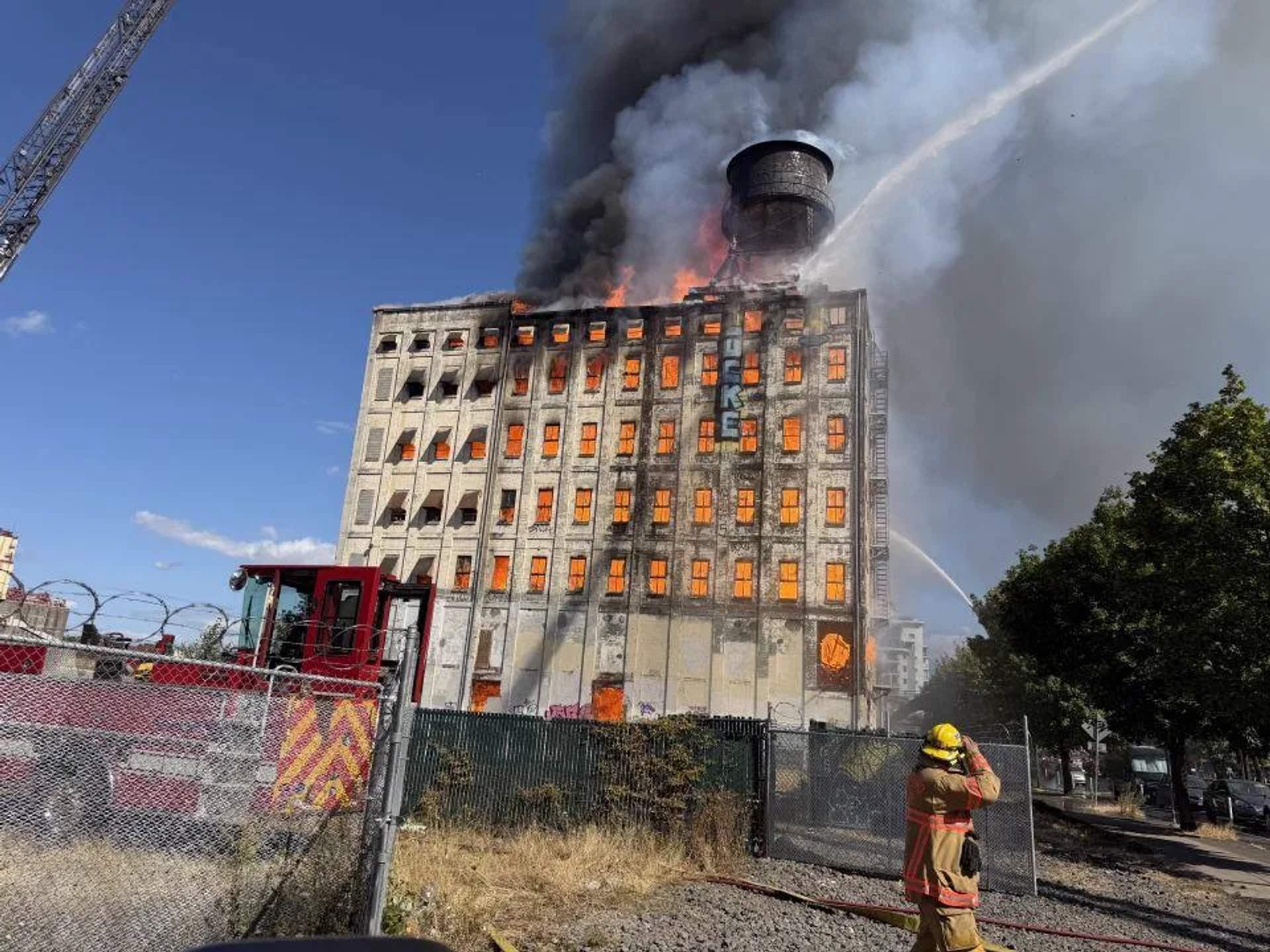 Flames engulf the historic Centennial Mills warehouse in Portland on August 2 2026