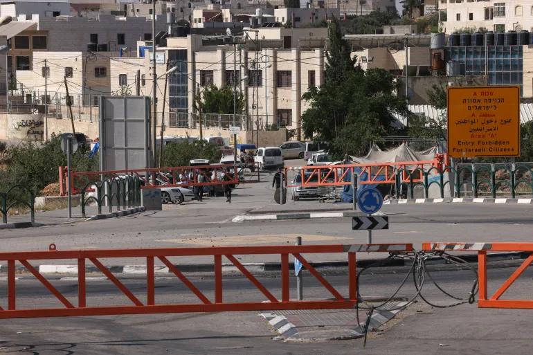 A picture shows closed iron gates set up by Israeli forces after Israeli authorities closed off all entrance and exist roads of Hebron city in the occupied West Bank on June 14, 2025 [Hazem Bader]