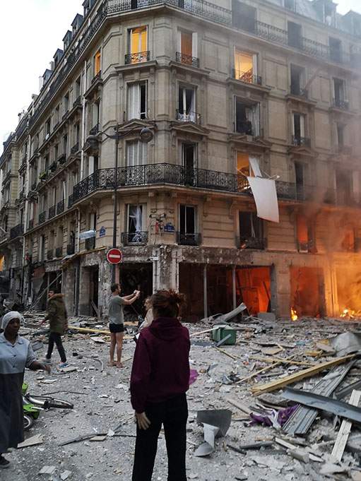 Emergency responders at the Paris bakery explosion site
