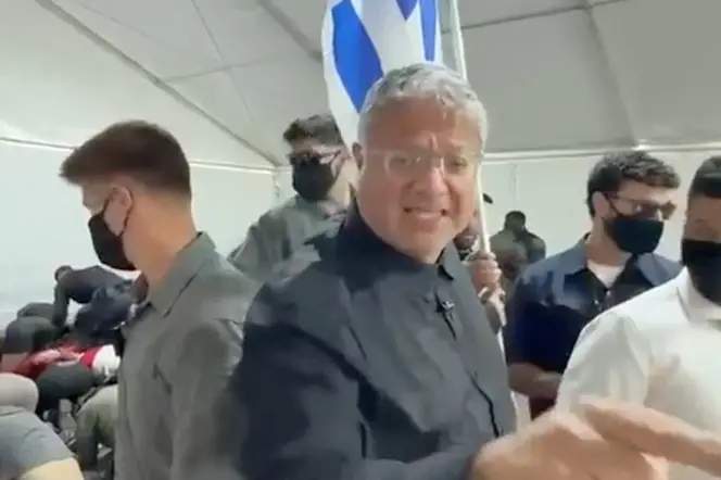 Itamar Ben-Gvir gesturing during visit to detained flotilla activists at Ashdod port
