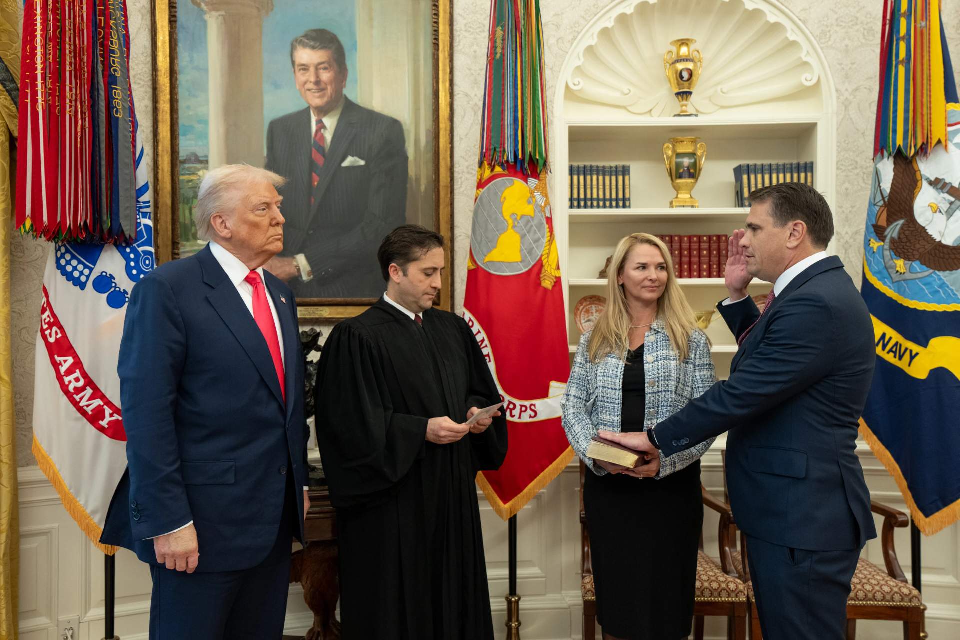 Donald Trump administering the oath of office to Todd Blanche in the Oval Office