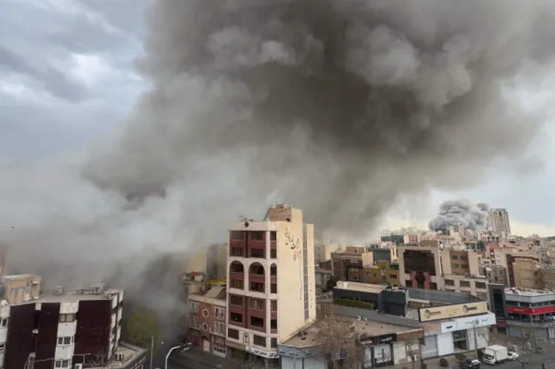 Smoke and explosion plumes rising over the Tehran skyline during Operation Epic Fury airstrikes on February 28, 2026