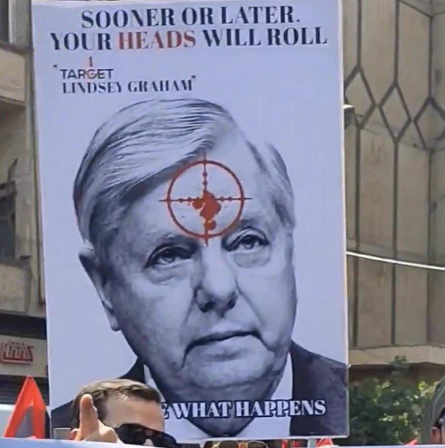 Poster calling for the death of Lindsey Graham at Iran protest.