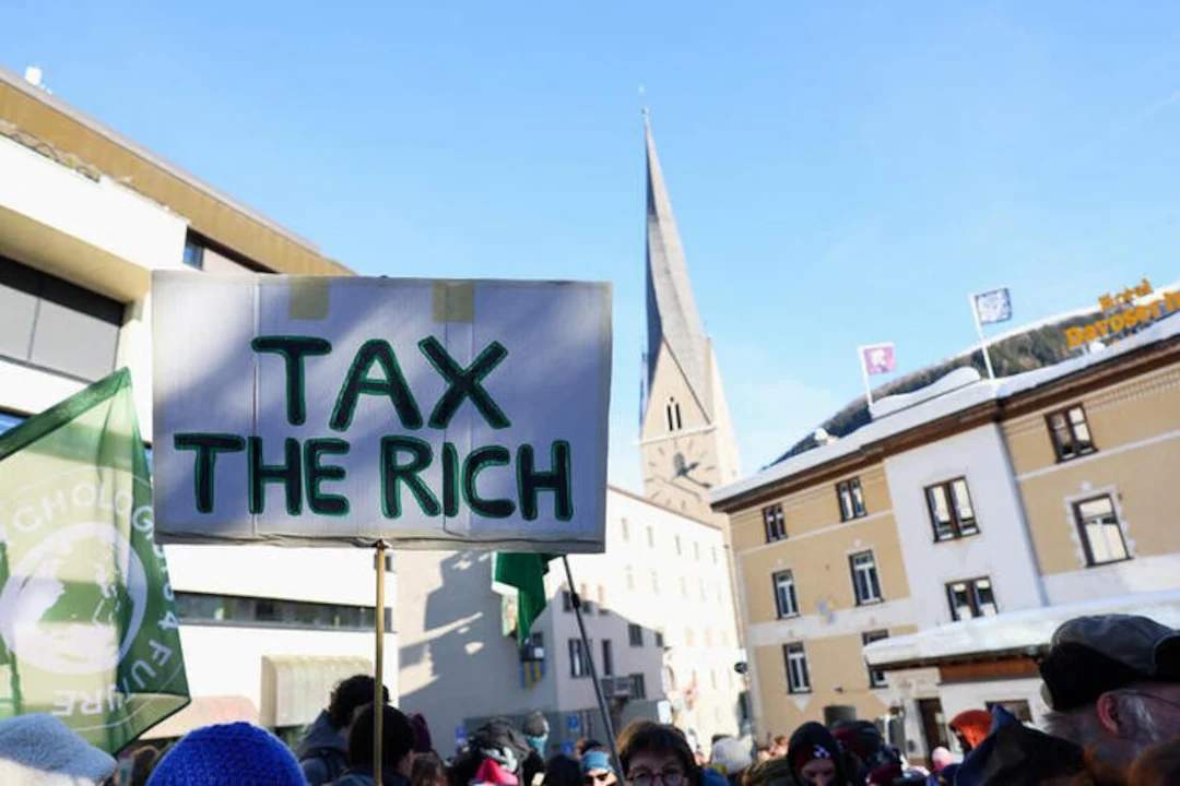 Protesters demonstrate outside the World Economic Forum in Davos against billionaire wealth and inequality