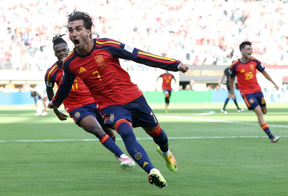 Spain's Ferran Torres scores the winning goal past Argentina's Emiliano Martinez during the 2026 FIFA World Cup Final at MetLife Stadium