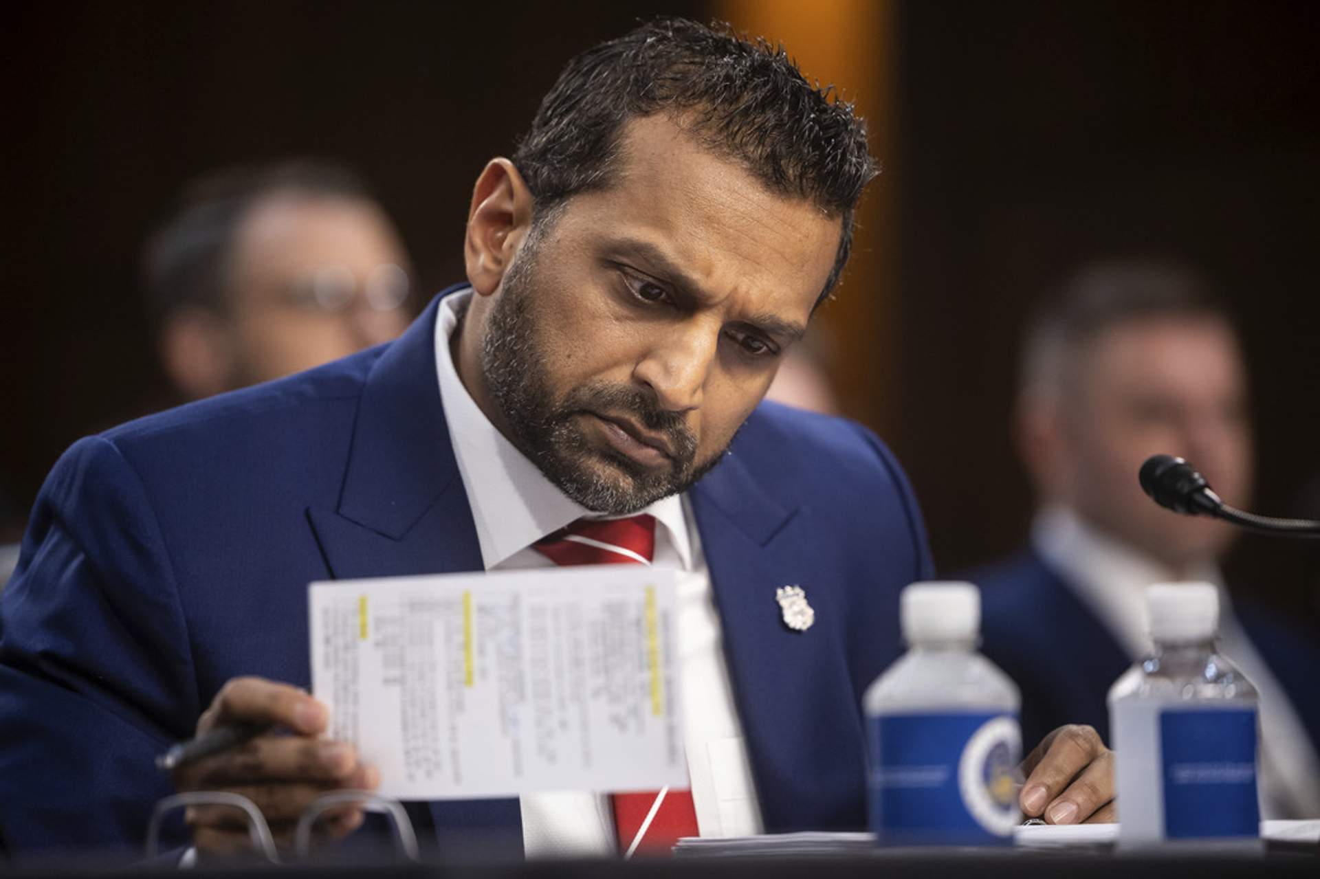 Kash Patel attempting to make sense of his notes through his obvious hang over as congress grills him about the Epstein cover up.