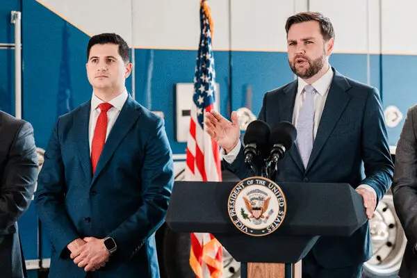 The acting U.S. attorney for the Central District of California, Bill Essayli, left, and Vice President JD Vance during a news conference last month in Los Angeles.