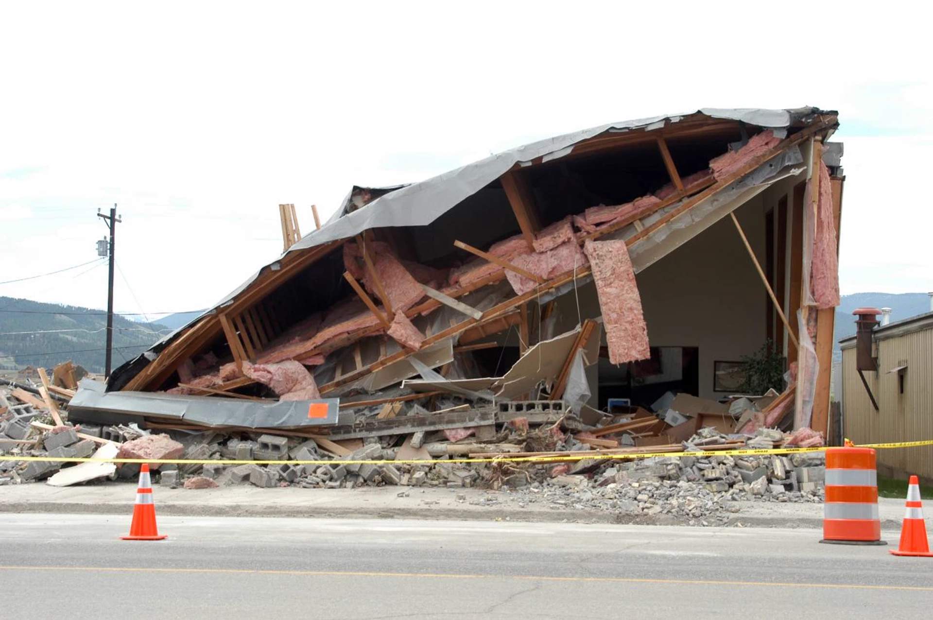 The destroyed Sky-Hi News newspaper office in Granby Colorado showing structural damage from the bulldozer rampage on June 4 2004