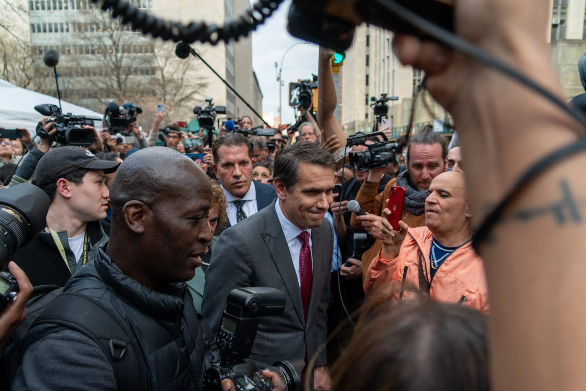 Todd Blanche walking outside a courthouse building in Manhattan