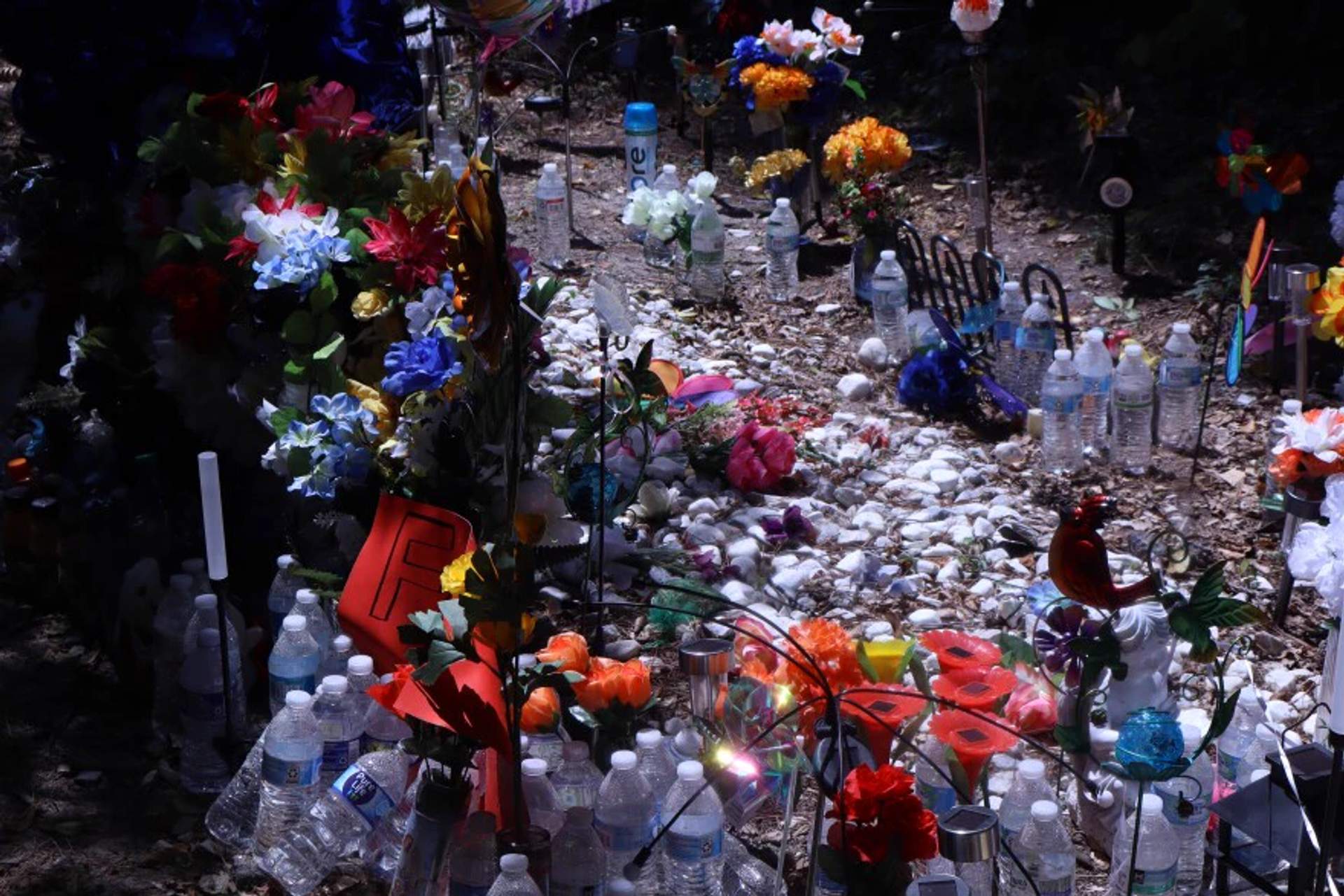 Memorial for Cyrus Carmack-Belton, 14, at the Shell gas station in Columbia, South Carolina where he was shot and killed by store owner Rick Chow over bottled water