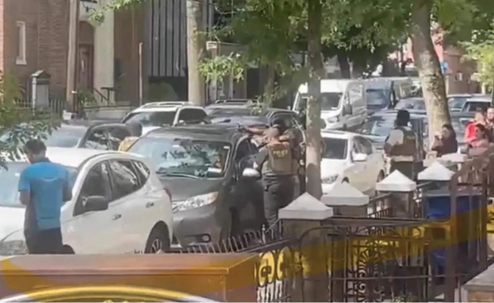 Masked ICE agents conduct enforcement operations in Queens, New York City