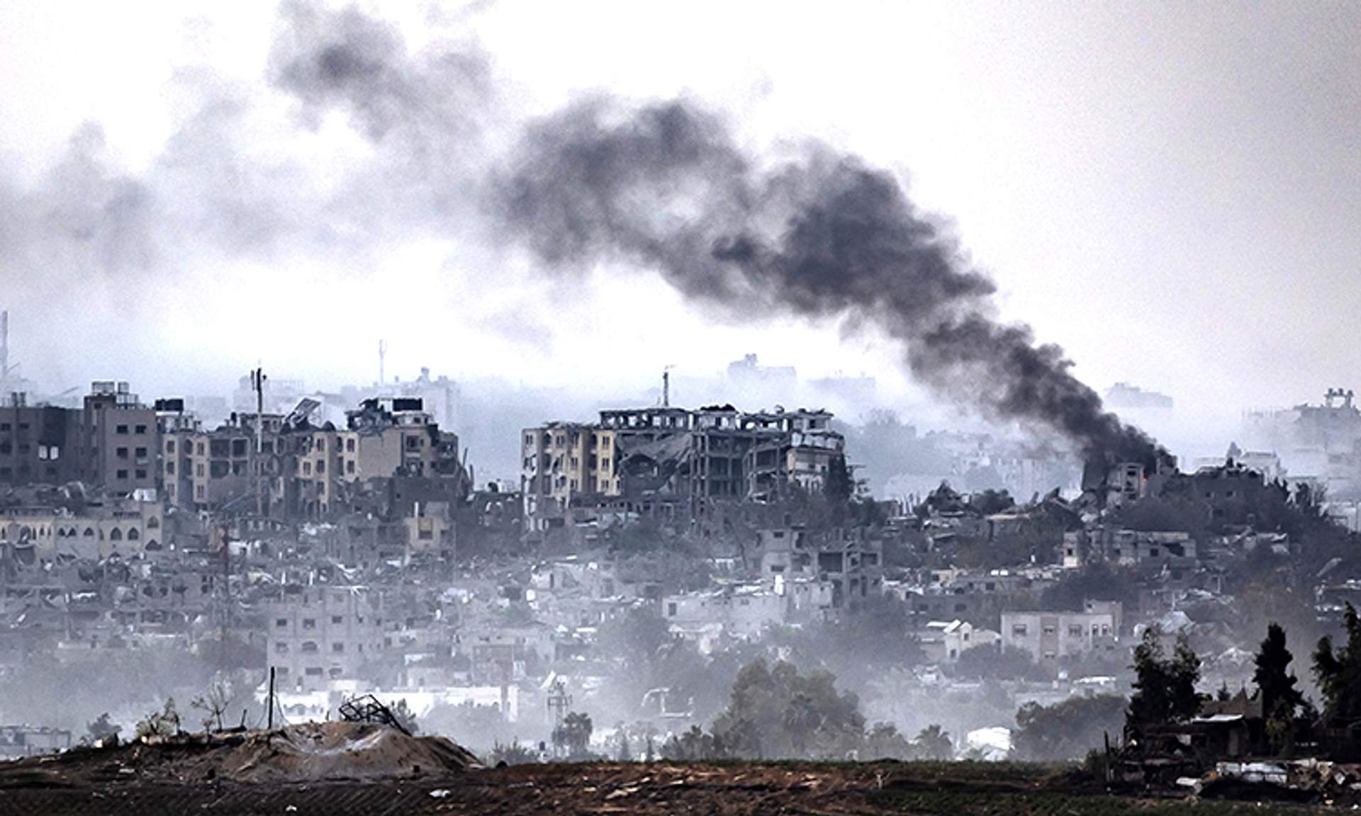 Smoke rises during Israeli bombardment of the Gaza Strip on Sunday amid ongoing battles between Israel and the Palestinian Hamas movement. Gaza, Palestine - Oct 29th, 2023