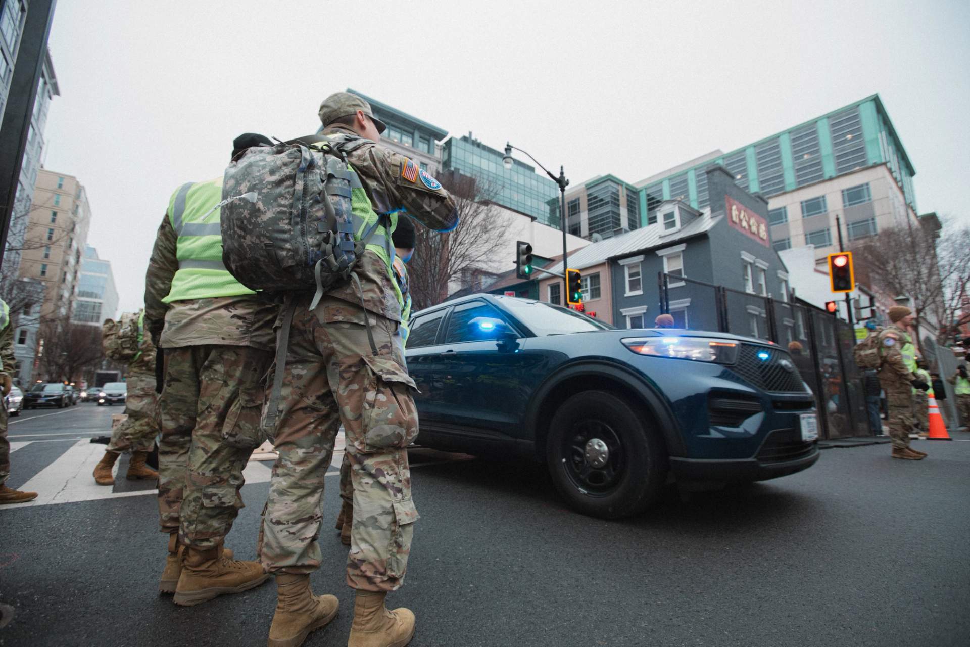 Security forces at a political demonstration (public domain, U.S. Army)