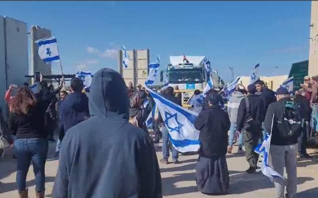 Israelis demonstrate at a protest action at Kerem Shalom border crossing on January 24, 2024